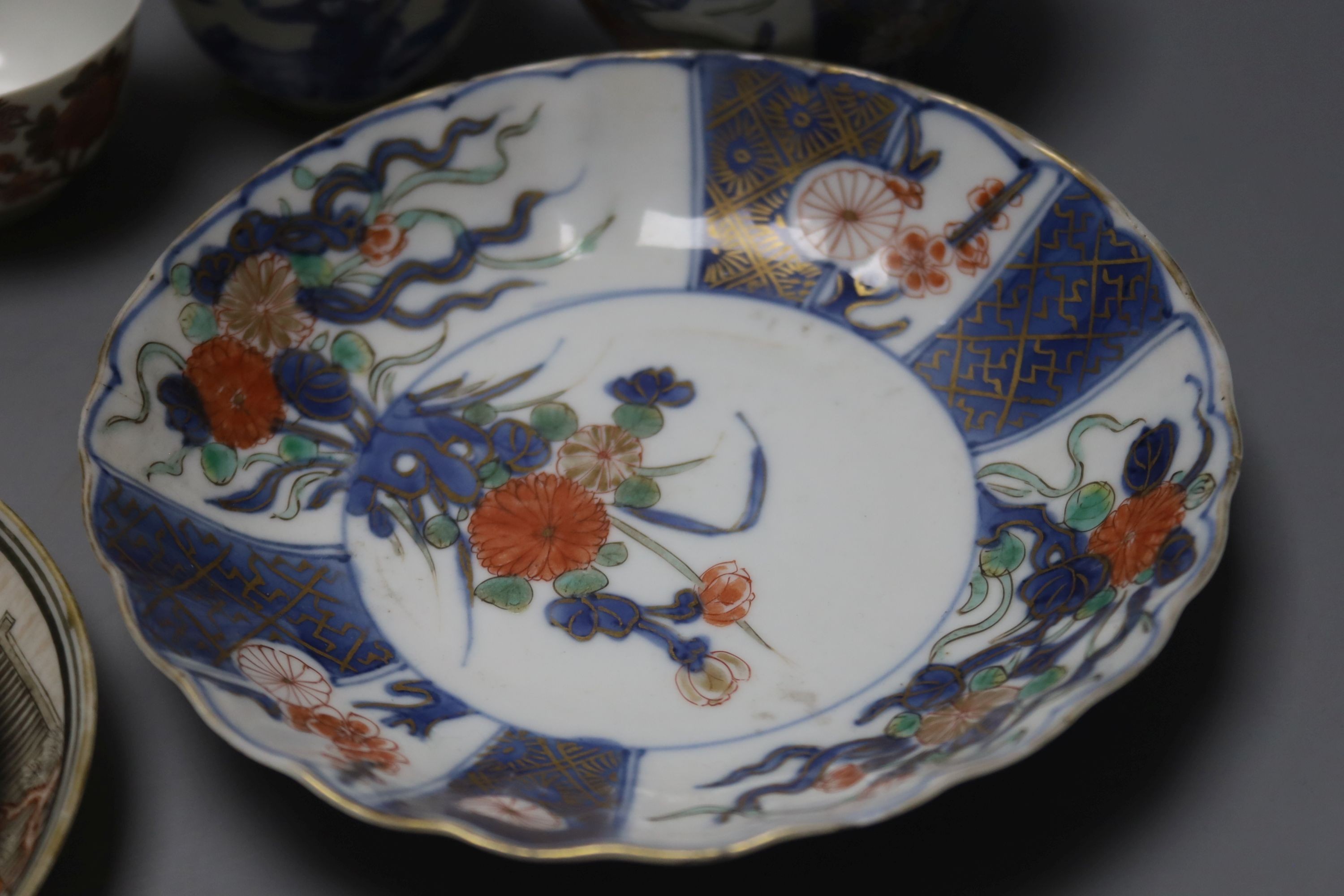 A group of Chinese enamelled porcelain vases and bowls, a similar blue-and-white jar and cover, 18th century and later